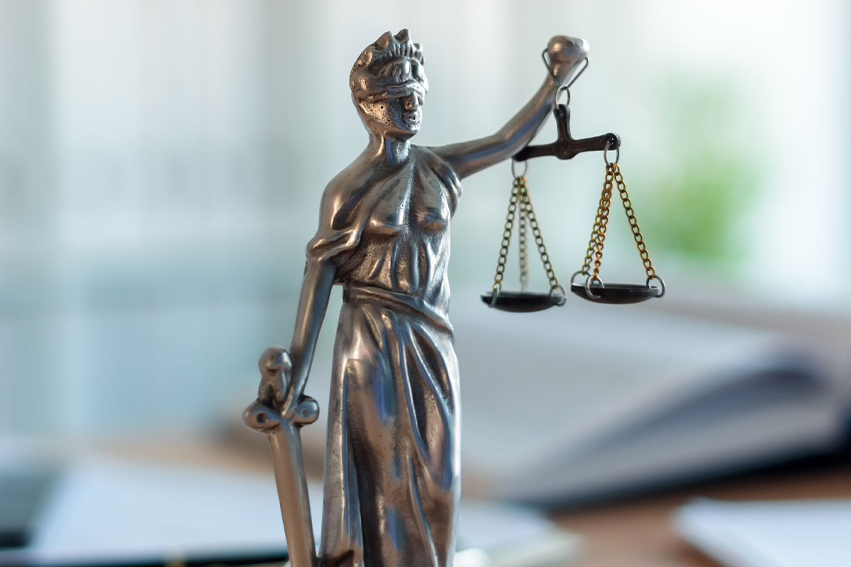 Female doctor using her digital tablet in the consultation.